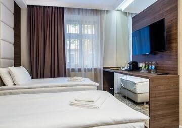 Фото номера Семейный трехместный номер Апарт-отели Aparthotel Rakowicka Residence г. Краков 2