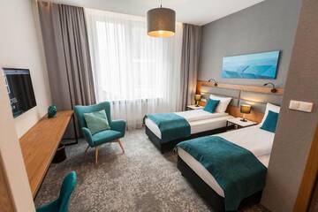 Фото номера Апартаменты бизнес-класса с 1 спальней Апарт-отели K4 APARTHOTEL KRAKÓW г. Краков 8