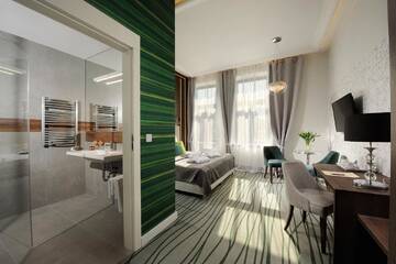 Фото номера Стандартный двухместный номер с 1 кроватью Отель Plaza Boutique Hotel г. Краков 6