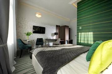 Фото номера Стандартный двухместный номер с 1 кроватью Отель Plaza Boutique Hotel г. Краков 7