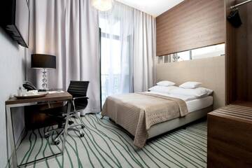 Фото номера Двухместный номер эконом-класса с 1 кроватью Отель Plaza Boutique Hotel г. Краков 3