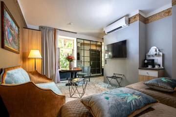 Фото номера Двухместный номер Делюкс с 1 кроватью Отель Balthazar Design Hotel г. Краков 11