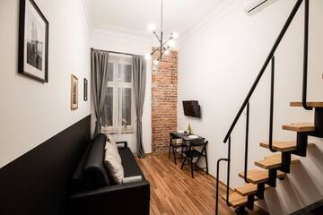Фото номера Апартаменты - Двухуровневые Апарт-отели DIETLA 99 APARTMENTS &amp; DAY SPA г. Краков 3