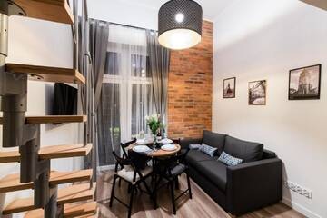 Фото номера Двухуровневые апартаменты Апарт-отели DIETLA 99 APARTMENTS &amp; DAY SPA г. Краков 3