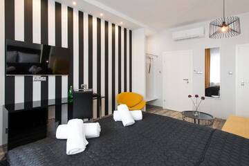 Фото номера Улучшенный двухместный номер с 1 кроватью Апартаменты Leo Apartments Old Town г. Краков 4