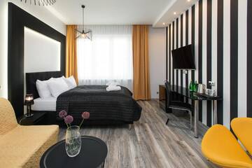 Фото номера Улучшенный двухместный номер с 1 кроватью Апартаменты Leo Apartments Old Town г. Краков 3