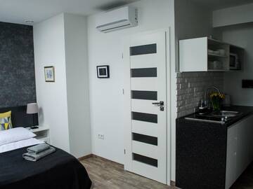 Фото номера Улучшенный двухместный номер с 1 кроватью Апарт-отели MODERN STUDIOS in OLD CITY KRAKÓW г. Краков 18