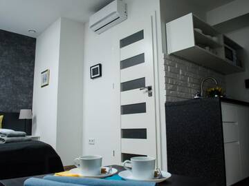 Фото номера Улучшенный двухместный номер с 1 кроватью Апарт-отели MODERN STUDIOS in OLD CITY KRAKÓW г. Краков 20