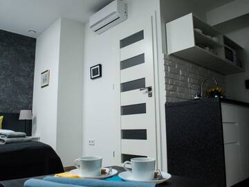Фото номера Улучшенный двухместный номер с 1 кроватью Апарт-отели MODERN STUDIOS in OLD CITY KRAKÓW г. Краков 9
