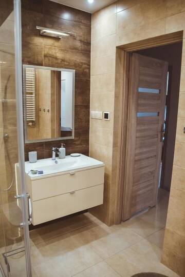 Фото номера Апартаменты с 2 спальнями Апартаменты Stawowa Premium Apartment - 69 m2 with a private garage г. Краков 79