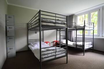 Фото номера Кровать в общем номере с 4 кроватями Хостелы NH Hostel - TBN House г. Краков 2