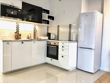 Фото номера Апартаменты с 2 спальнями Апартаменты In Vogue Apartments г. Краков 12