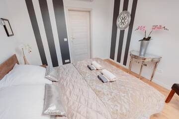 Фото номера Апартаменты с 2 спальнями Апартаменты In Vogue Apartments г. Краков 15