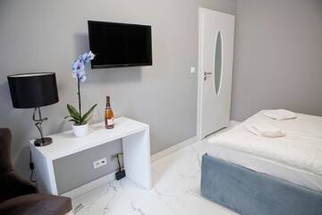 Фото номера Апартаменты с 3 спальнями Апартаменты Elegant City Center Zyblikiewicza 14 г. Краков 16