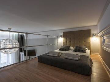 Фото номера Апартаменты с мезонином Апартаменты Loretańska Apartments 6 г. Краков 4