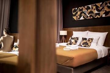 Фото номера Четырехместный номер с видом на город Апарт-отели Zulian Aparthotel by Artery Hotels г. Краков 14