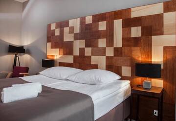 Фото номера Номер с кроватью размера «king-size» Отель Dada Boutique Home Hotel г. Краков 14