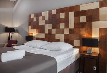 Фото номера Номер с кроватью размера «king-size» Отель Dada Boutique Home Hotel г. Краков 7