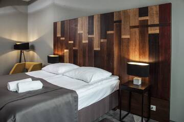 Фото номера Номер с кроватью размера «king-size» Отель Dada Boutique Home Hotel г. Краков 4