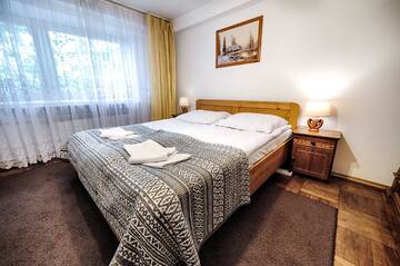 Фото номера Апартаменты с 2 спальнями с видом на сад Апартаменты Bagry Rooms г. Краков 12