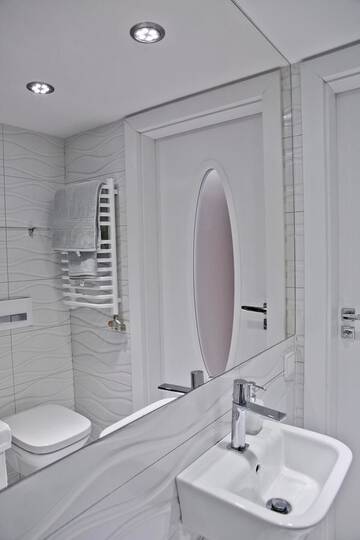 Фото номера Апартаменты с балконом Апартаменты Elegant Studio Bonerowska г. Краков 9