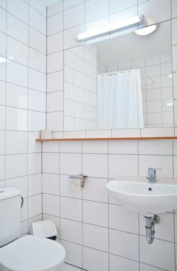Фото номера Двухместный номер с 2 отдельными кроватями и собственной ванной комнатой Гостевой дом Dom Turystyczny Indigo г. Краков 11
