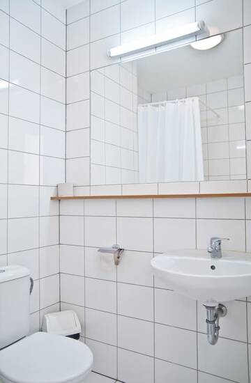 Фото номера Двухместный номер с 2 отдельными кроватями и собственной ванной комнатой Гостевой дом Dom Turystyczny Indigo г. Краков 3