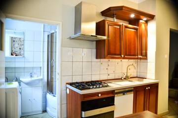 Фото номера Апартаменты с 1 спальней Апартаменты FatCat Apartments г. Краков 20