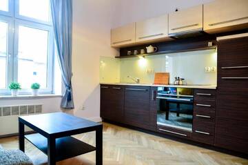 Фото номера Апартаменты с 2 спальнями Апартаменты FatCat Apartments г. Краков 6