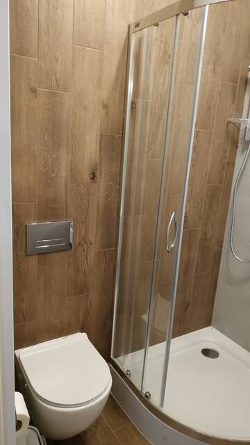 Фото номера Двухместный номер с 1 кроватью Проживание в семье Lukas Guest Rooms г. Краков 10