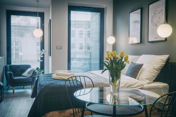 Фото номера Номер «Темный» Апарт-отели RAJSKA 3 by PI Apartments г. Краков 2