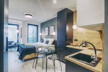 Фото номера Номер «Темный» Апарт-отели RAJSKA 3 by PI Apartments г. Краков 3
