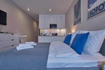 Фото номера Номер «Серый» Апарт-отели RAJSKA 3 by PI Apartments г. Краков 4