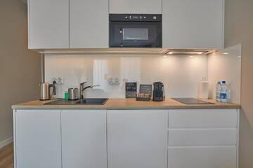 Фото номера Номер «Серый» Апарт-отели RAJSKA 3 by PI Apartments г. Краков 7