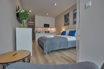 Фото номера Номер «Серый» Апарт-отели RAJSKA 3 by PI Apartments г. Краков 8
