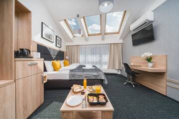 Фото номера Четырехместный номер Апарт-отели Aron Residence Old Town г. Краков 6