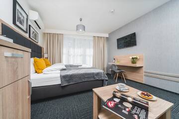 Фото номера Четырехместный номер Апарт-отели Aron Residence Old Town г. Краков 7