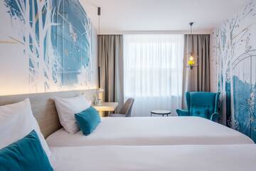 Фото номера Стандартный двухместный номер с 2 отдельными кроватями Отель ibis Styles Kraków East г. Краков 6