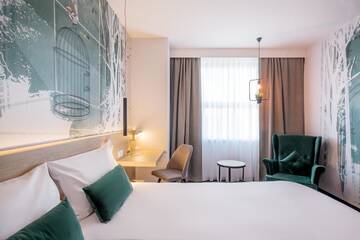 Фото номера Стандартный номер с двуспальной кроватью Отель ibis Styles Kraków East г. Краков 7