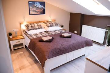 Фото номера Апартаменты с 2 спальнями Апарт-отели Old Town Vistula Premium Apartments г. Краков 49