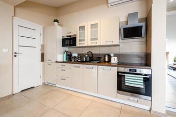 Фото номера Апартаменты с 2 спальнями Апарт-отели Old Town Vistula Premium Apartments г. Краков 34