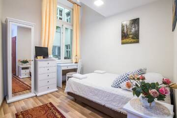 Фото Проживание в семье Pokoje Gościnne Unikat г. Краков 2