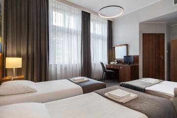 Фото номера Трехместный номер Отель Hotel Alexander 2 г. Краков 7