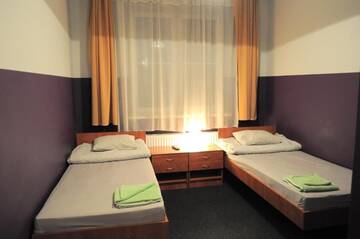 Фото номера Двухместный номер с 2 отдельными кроватями Хостелы Freedom Hostel г. Краков 18