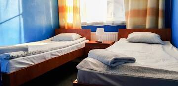 Фото номера Двухместный номер с 2 отдельными кроватями Хостелы Freedom Hostel г. Краков 14