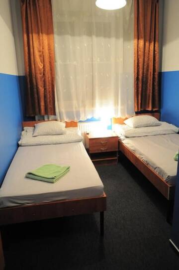 Фото номера Двухместный номер с 2 отдельными кроватями Хостелы Freedom Hostel г. Краков 15
