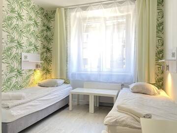 Фото номера Двухместный номер Делюкс с 2 отдельными кроватями Хостелы Freedom Hostel г. Краков 11