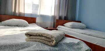 Фото номера Двухместный номер с 2 отдельными кроватями Хостелы Freedom Hostel г. Краков 11