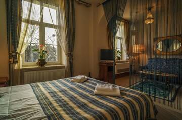 Фото номера Двухместный номер Делюкс с 1 кроватью Отель Old Time Hotel г. Краков 7