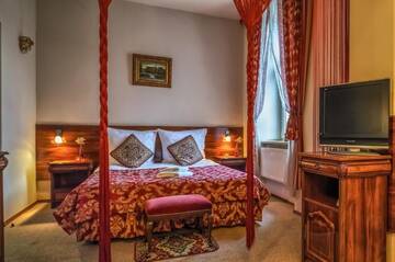 Фото номера Двухместный номер Делюкс с 1 кроватью Отель Old Time Hotel г. Краков 8